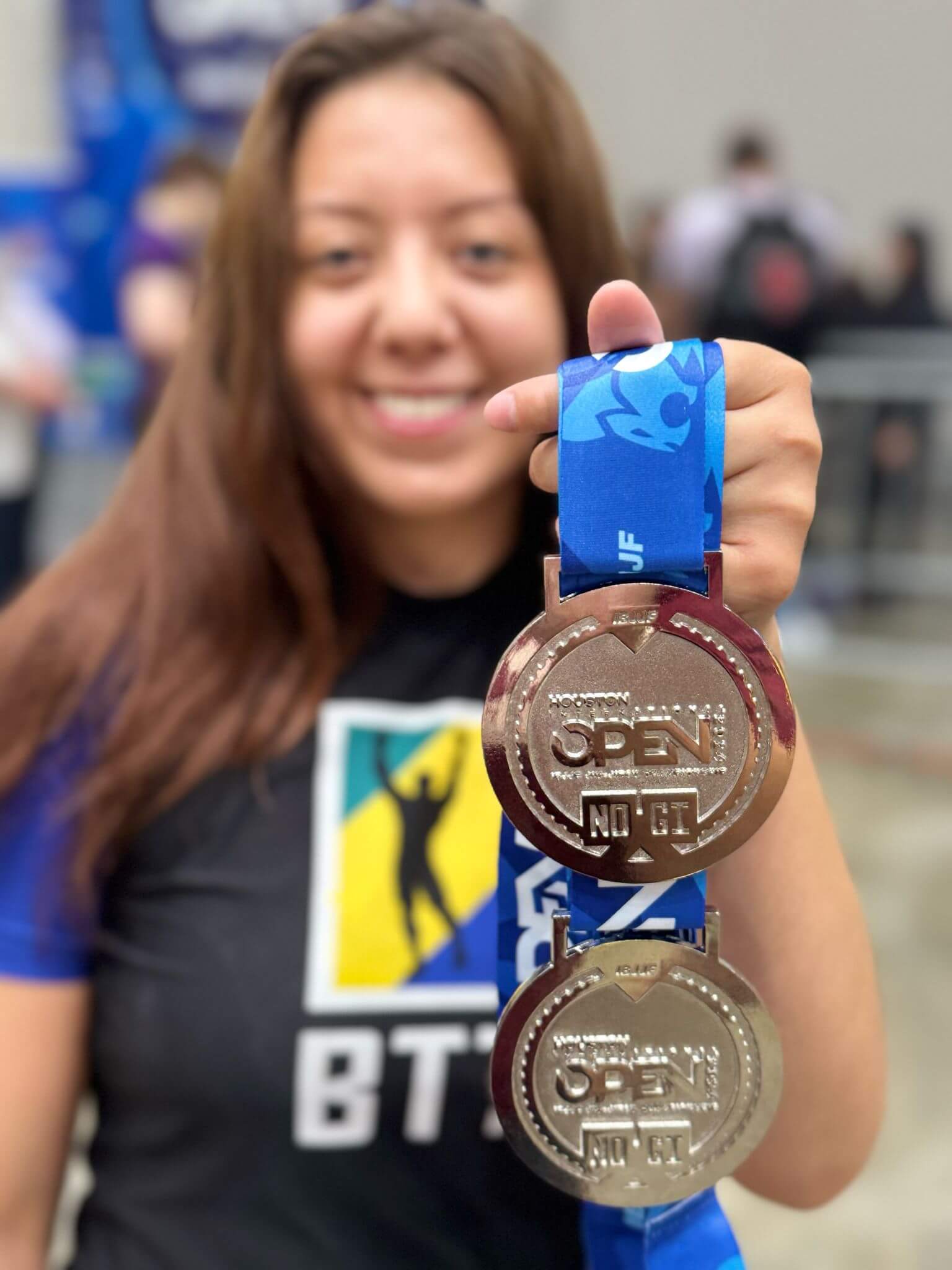 BTT student showing competition medals